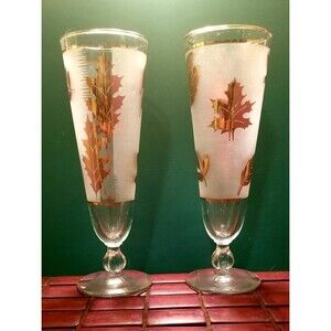 Pair of Mid Century Libbey 24kt Gold Leaf Pattern Frosted Footed Pilsner Glasses